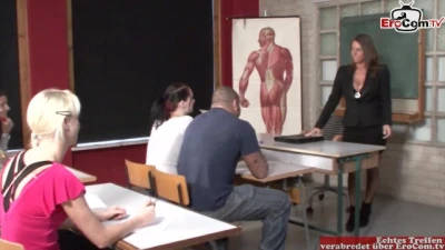 MILF Teacher with Big Natural Tits Seduces a Student for Sex in the Classroom